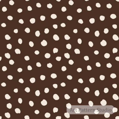 Deep chocolate and atelier ivory organic irregular dot seamless pattern for fashion textiles wallpaper stationery and packaging